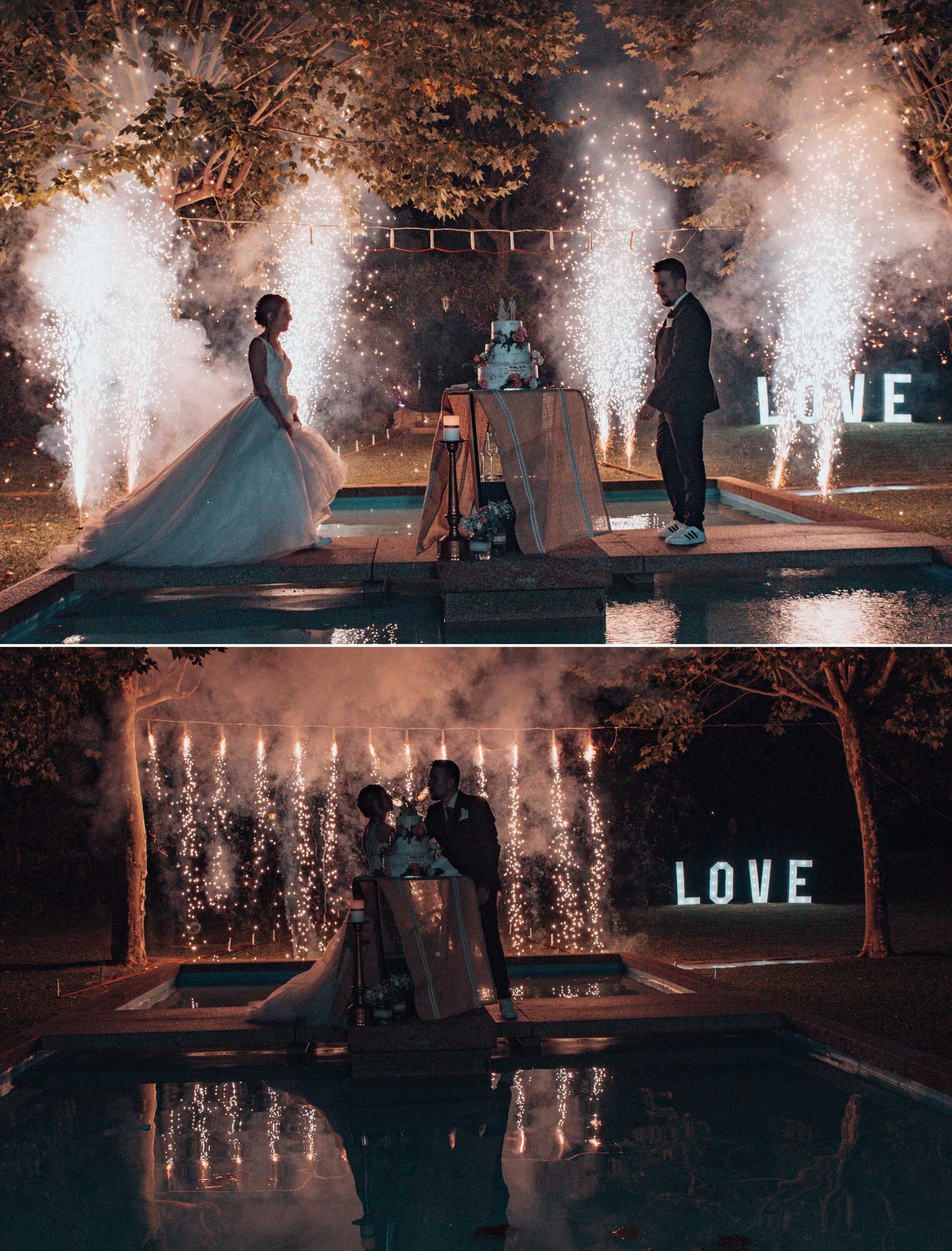 Casal a cortagem do bolo e de fundo fogos de artifício