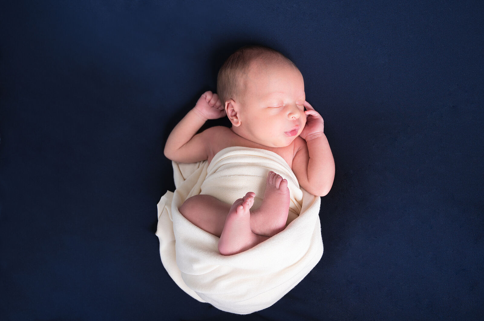 Newborn baby portrait wrapped in blanket, NJ studio photography
