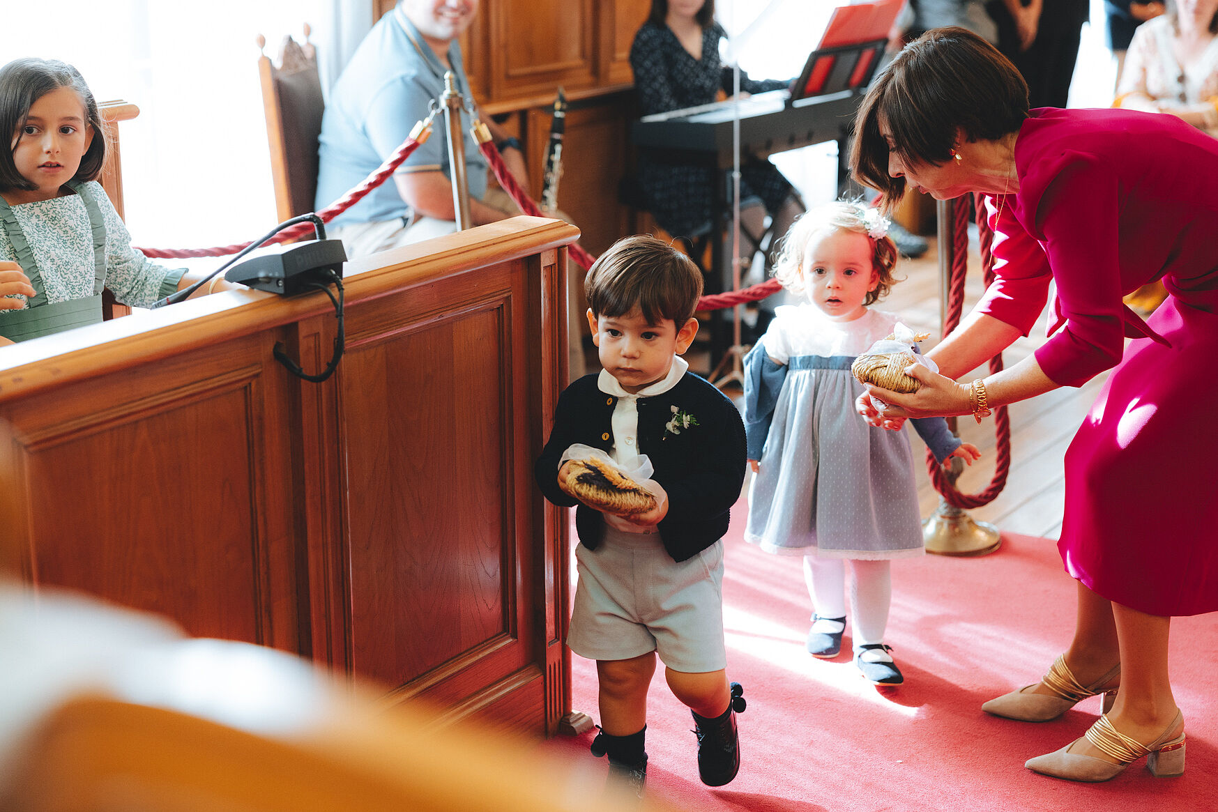 Children acting as pageboys and flower girls at a civil wedding ceremony at Portugalete Town Hall, Bizkaia.
