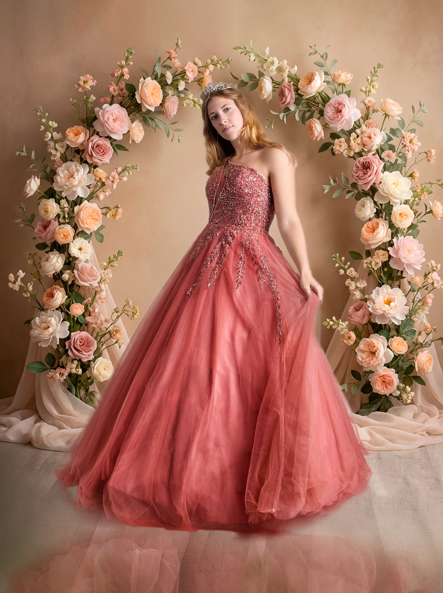Sesión de fotos de quinceañera con vestido de gala rosa y corona en estudio de Almería